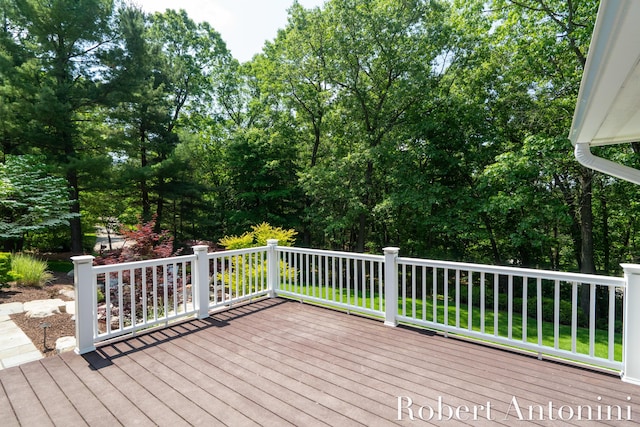 1977 Emerald Glen Ct NE, Ada, MI 49301 - wooden deck with view of wooded area