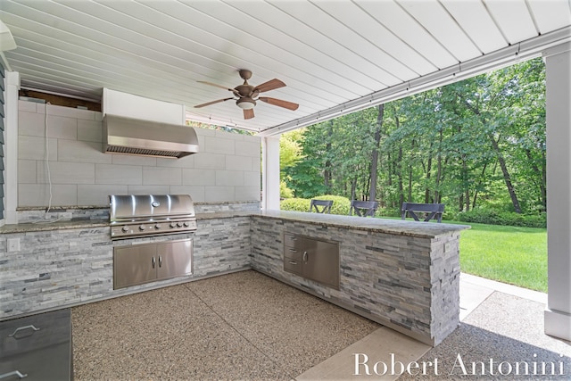 1977 Emerald Glen Ct NE, Ada, MI 49301 - view of patio with exterior kitchen and ceiling fan