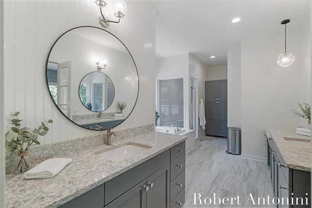 1977 Emerald Glen Ct NE, Ada, MI 49301 - bathroom featuring two vanities