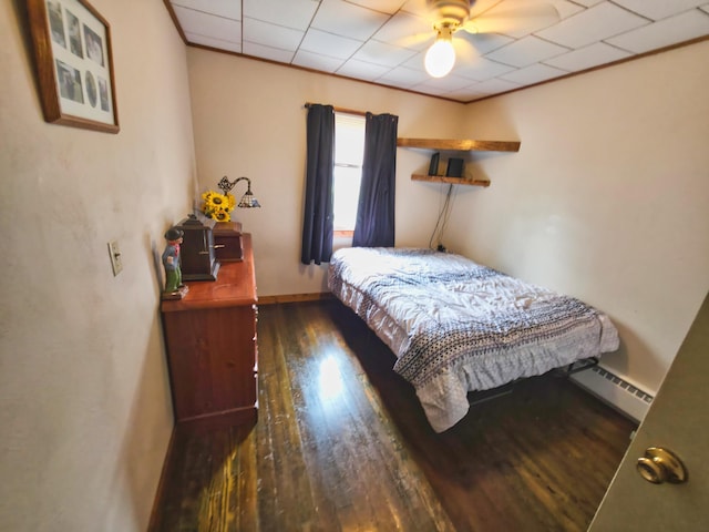 135 Teal Dr, Coldwater, MI 49036 - bedroom with a baseboard radiator and wood finished floors