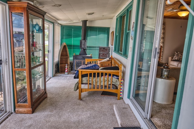 135 Teal Dr, Coldwater, MI 49036 - sunroom / solarium featuring a wood stove