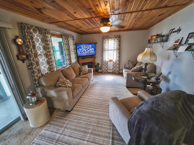 135 Teal Dr, Coldwater, MI 49036 - living room with wooden ceiling, a ceiling fan, and a fireplace