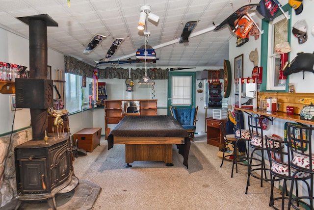 135 Teal Dr, Coldwater, MI 49036 - rec room with carpet flooring, billiards, and a wood stove