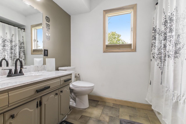 9749 48th Ave, Allendale, MI 49401 - bathroom with vanity, stone finish flooring, and a shower with curtain
