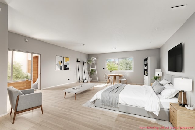 9749 48th Ave, Allendale, MI 49401 - bedroom with light wood-style flooring and baseboards