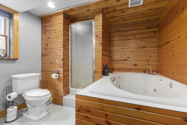 9749 48th Ave, Allendale, MI 49401 - bathroom featuring wooden walls, a jetted tub, a stall shower, and tile patterned flooring