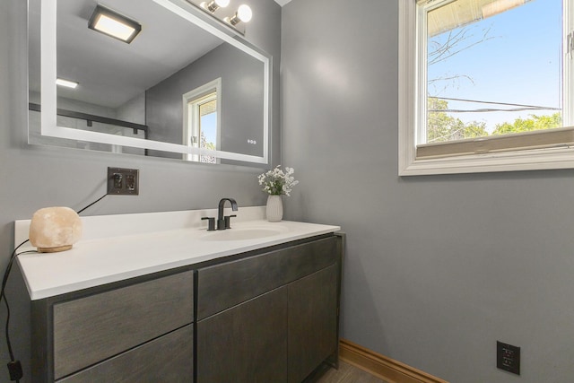 9749 48th Ave, Allendale, MI 49401 - bathroom featuring vanity and wood finished floors