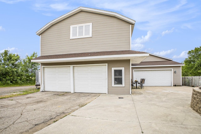 9749 48th Ave, Allendale, MI 49401 - garage featuring concrete driveway