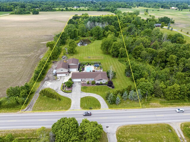 9749 48th Ave, Allendale, MI 49401 - aerial overview of property's location with property boundaries highlighted and a tree filled landscape