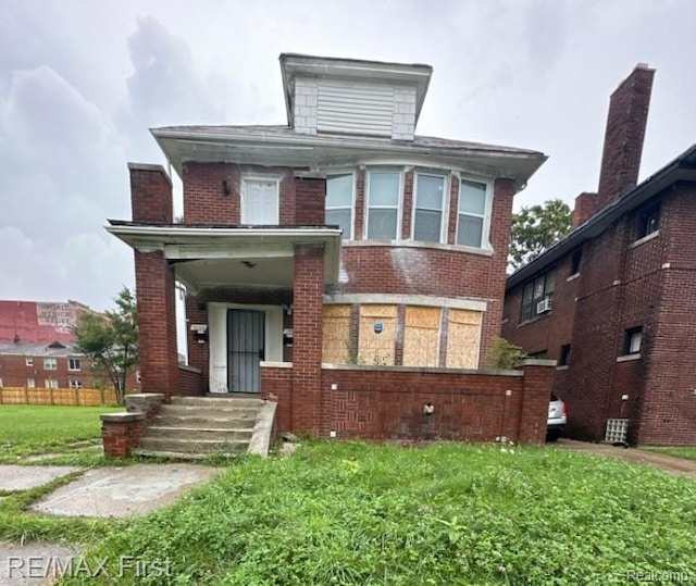 1732 Burlingame St, Detroit, MI 48206 - american foursquare style home with brick siding and a front lawn