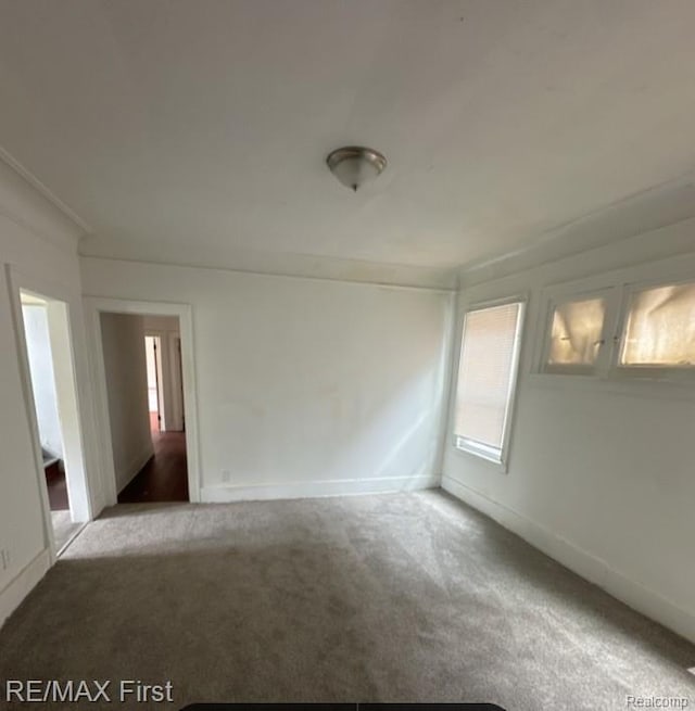 1732 Burlingame St, Detroit, MI 48206 - carpeted empty room with baseboards