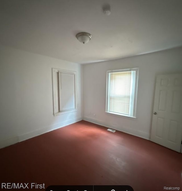 1732 Burlingame St, Detroit, MI 48206 - carpeted spare room featuring baseboards