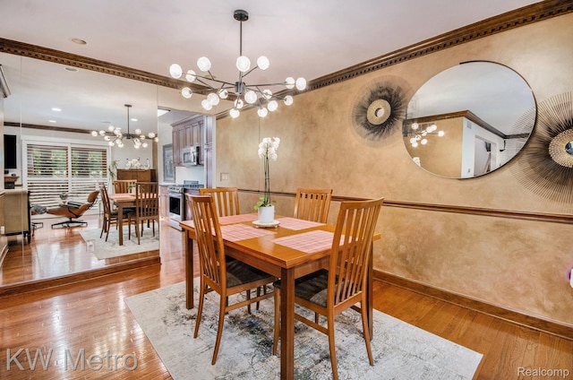 6271 Potomac Cir W, Bloomfield, MI 48322 - dining room with a chandelier, wood-type flooring, and ornamental molding