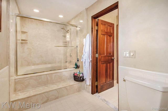 6271 Potomac Cir W, Bloomfield, MI 48322 - full bathroom with enclosed tub / shower combo, tile patterned floors, a wainscoted wall, recessed lighting, and tile walls