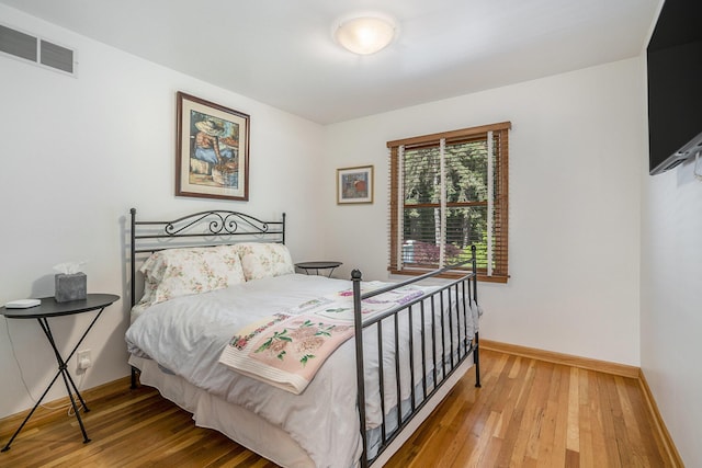 6368 E Lake Ln, Sawyer, MI 49125 - bedroom with wood finished floors and baseboards