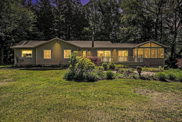 6368 E Lake Ln, Sawyer, MI 49125 - back of house with a sunroom and a yard