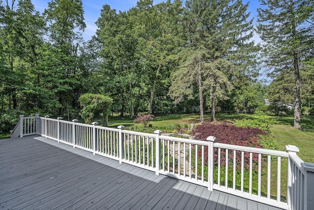 6368 E Lake Ln, Sawyer, MI 49125 - wooden deck with a lawn and view of scattered trees