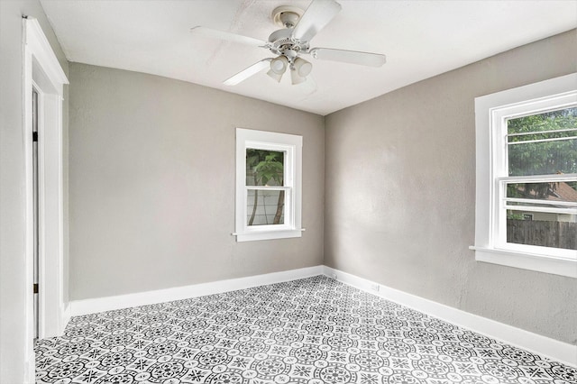 436 Quimby St NE, Grand Rapids, MI 49505 - unfurnished room with ceiling fan and baseboards