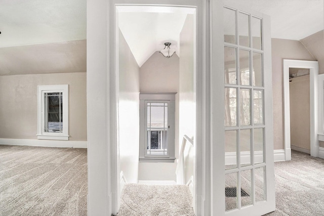 436 Quimby St NE, Grand Rapids, MI 49505 - hallway with vaulted ceiling and carpet flooring
