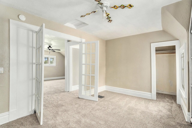 436 Quimby St NE, Grand Rapids, MI 49505 - unfurnished bedroom featuring carpet and vaulted ceiling