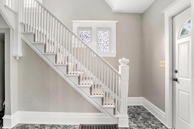 436 Quimby St NE, Grand Rapids, MI 49505 - foyer featuring stairs and baseboards
