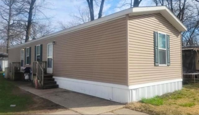 3728 Richardson St, Muskegon, MI 49442 - view of home's exterior featuring a trampoline