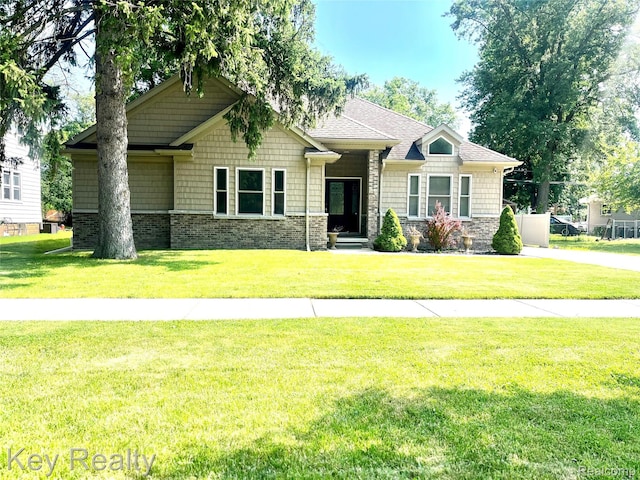 7949 Church Rd, Grosse Ile, MI 48138 - craftsman house with a front yard