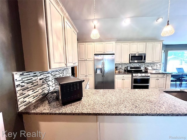 7949 Church Rd, Grosse Ile, MI 48138 - kitchen featuring stainless steel appliances, decorative backsplash, a peninsula, and hanging light fixtures