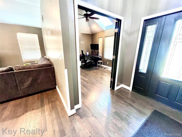 7949 Church Rd, Grosse Ile, MI 48138 - foyer entrance with wood finished floors, ceiling fan, and plenty of natural light