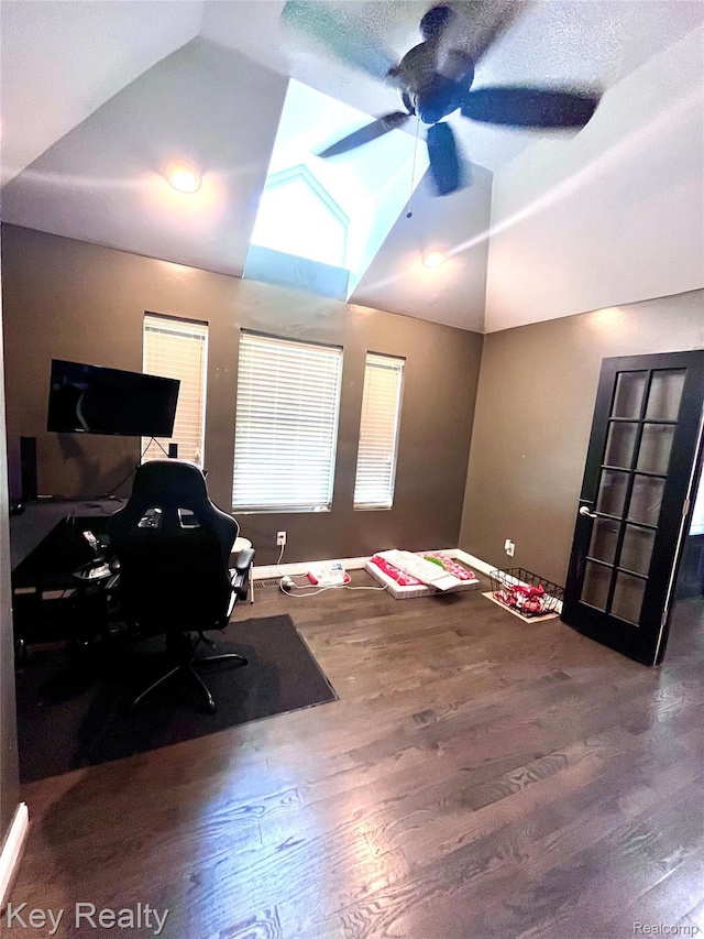 7949 Church Rd, Grosse Ile, MI 48138 - home office with lofted ceiling, wood finished floors, and a ceiling fan