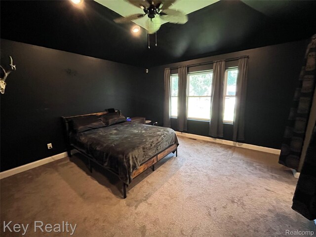 7949 Church Rd, Grosse Ile, MI 48138 - carpeted bedroom with baseboards and ceiling fan
