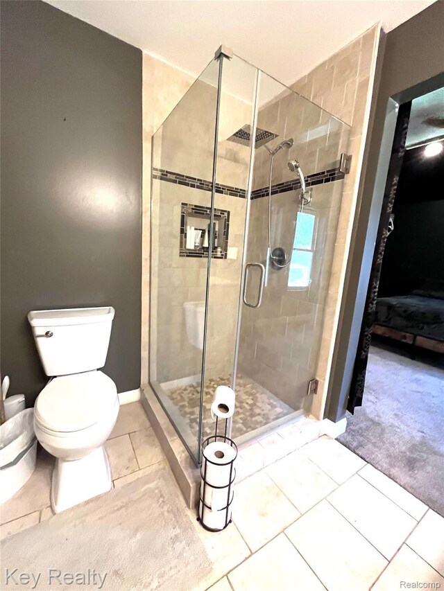 7949 Church Rd, Grosse Ile, MI 48138 - ensuite bathroom featuring tile patterned flooring and a shower stall
