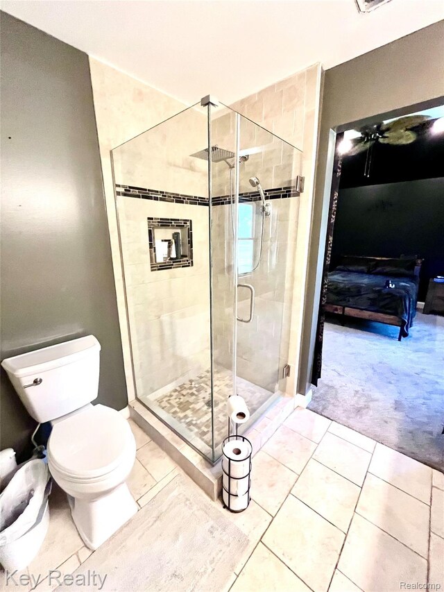 7949 Church Rd, Grosse Ile, MI 48138 - bathroom with tile patterned floors, a shower stall, and ensuite bath