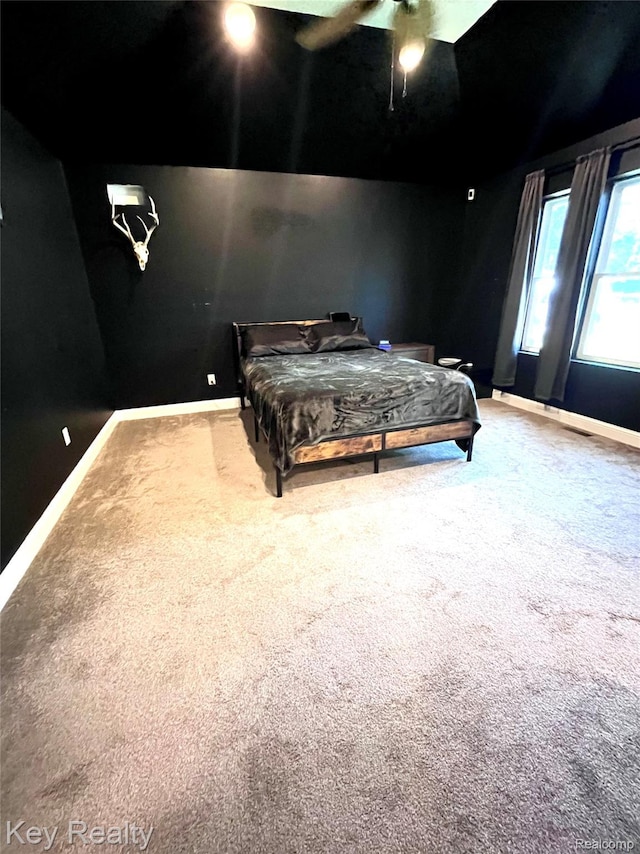 7949 Church Rd, Grosse Ile, MI 48138 - carpeted bedroom with baseboards and ceiling fan