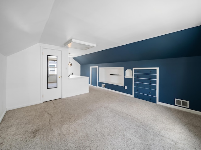 2391 Cambridge Rd, Berkley, MI 48072 - additional living space with vaulted ceiling, carpet flooring, and built in shelves