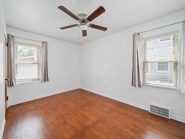 2391 Cambridge Rd, Berkley, MI 48072 - spare room with wood finished floors, ceiling fan, and ornamental molding
