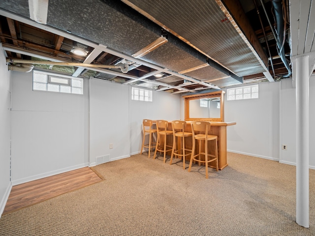 2391 Cambridge Rd, Berkley, MI 48072 - below grade area with a dry bar, carpet flooring, and plenty of natural light