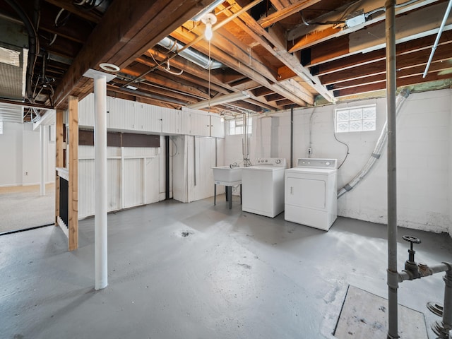 2391 Cambridge Rd, Berkley, MI 48072 - basement with washing machine and dryer and a sink