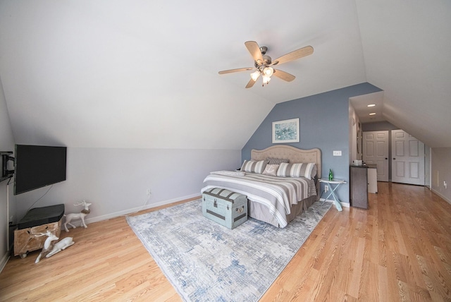 828 Russmiller Loop, Brooklyn, MI 49230 - bedroom featuring wood finished floors, lofted ceiling, and a ceiling fan