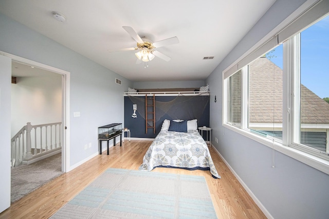 828 Russmiller Loop, Brooklyn, MI 49230 - bedroom featuring wood finished floors and a ceiling fan
