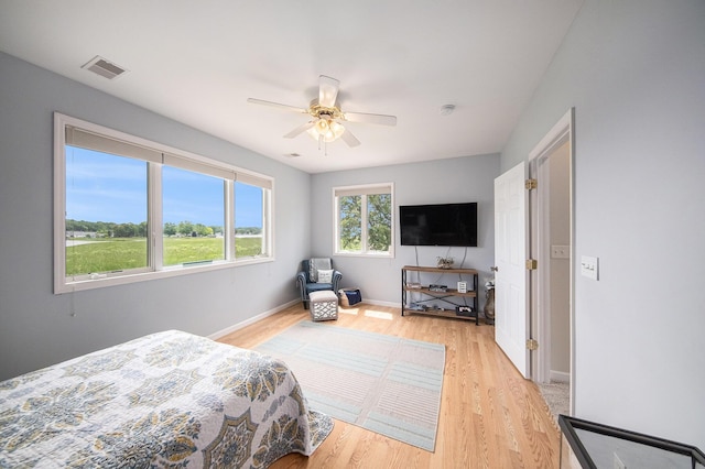 828 Russmiller Loop, Brooklyn, MI 49230 - bedroom featuring light wood finished floors and ceiling fan