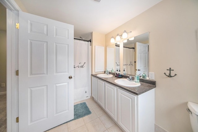 828 Russmiller Loop, Brooklyn, MI 49230 - bathroom with double vanity and tile patterned floors