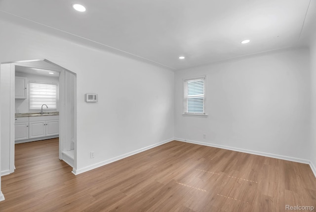 7768 Asbury Park, Dearborn, MI 48228 - unfurnished room featuring light wood-style flooring and recessed lighting