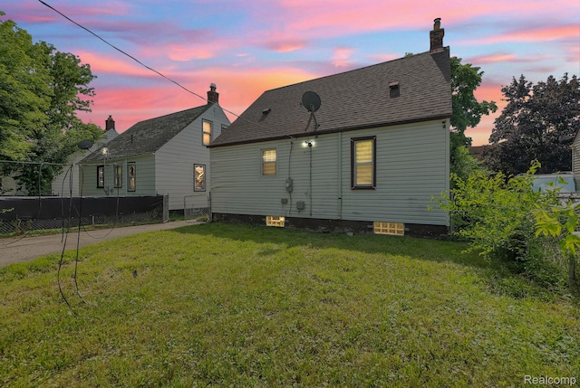 7768 Asbury Park, Dearborn, MI 48228 - back of house featuring a chimney