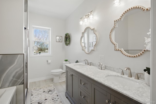 619 N Watkins, Perry, MI 48872 - bathroom featuring double vanity and a shower