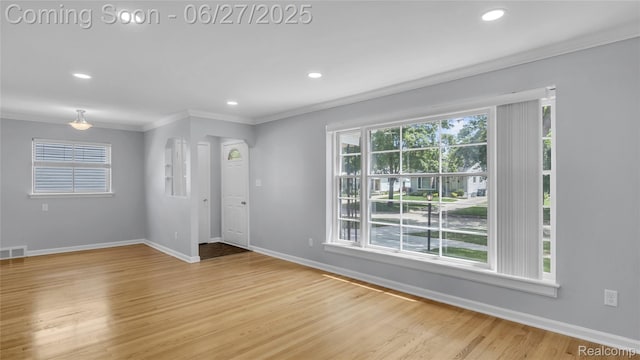 322 S Manitou Ave, Troy, MI 48017 - entryway with ornamental molding, healthy amount of natural light, light wood-style floors, and recessed lighting