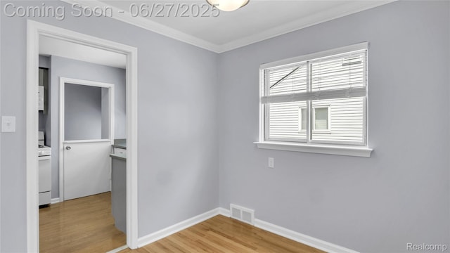 322 S Manitou Ave, Troy, MI 48017 - spare room with light wood finished floors and ornamental molding