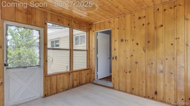 322 S Manitou Ave, Troy, MI 48017 - spare room with wood walls, plenty of natural light, and wooden ceiling