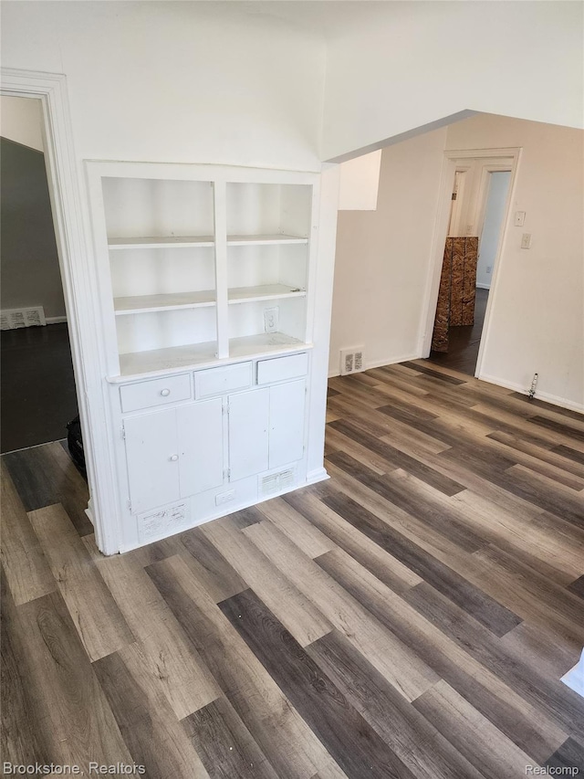 8428 Rosemont Ave, Dearborn Heights, MI 48228 - empty room with dark wood-style floors and baseboards
