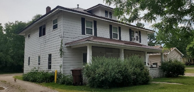 708 N Main St, Mount Pleasant, MI 48858 - view of front of home featuring a chimney
